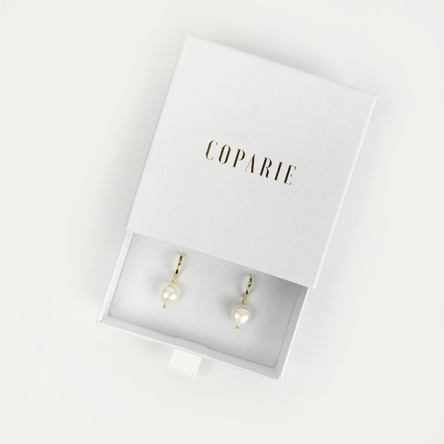 Produktfoto Creolen "Ocean Love" - Ohrringe im Shop von COPARIE.